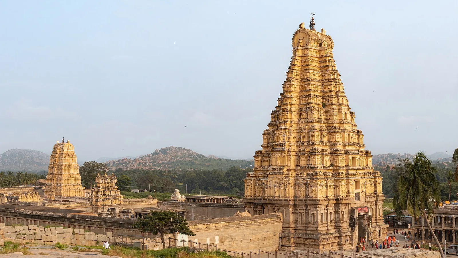 The gopura of the Virupaksha temple rising over the ruins at Hampi