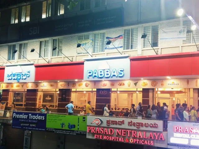 The lit front of Pabba's Ideal Ice Cream Cafe at night