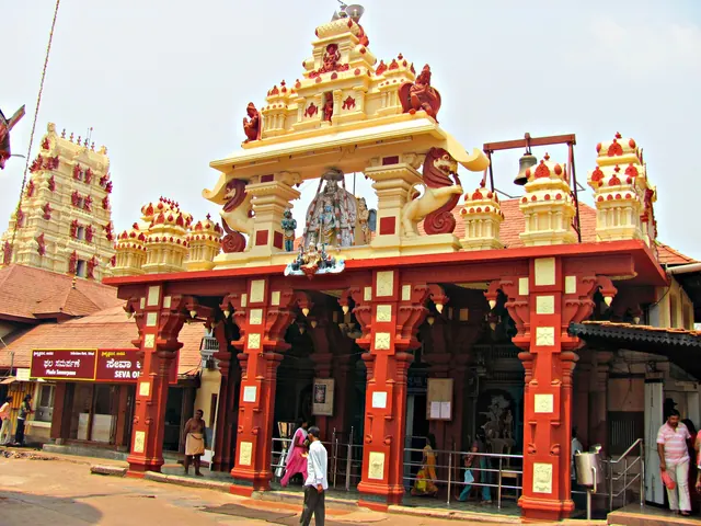 The red and gold entrance of the Sri Krishna Matha on Car Street, Udupi