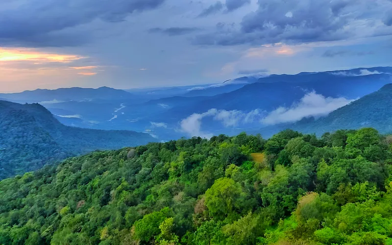Mist and evening light over the Sahyadri valleys near Sirsi
